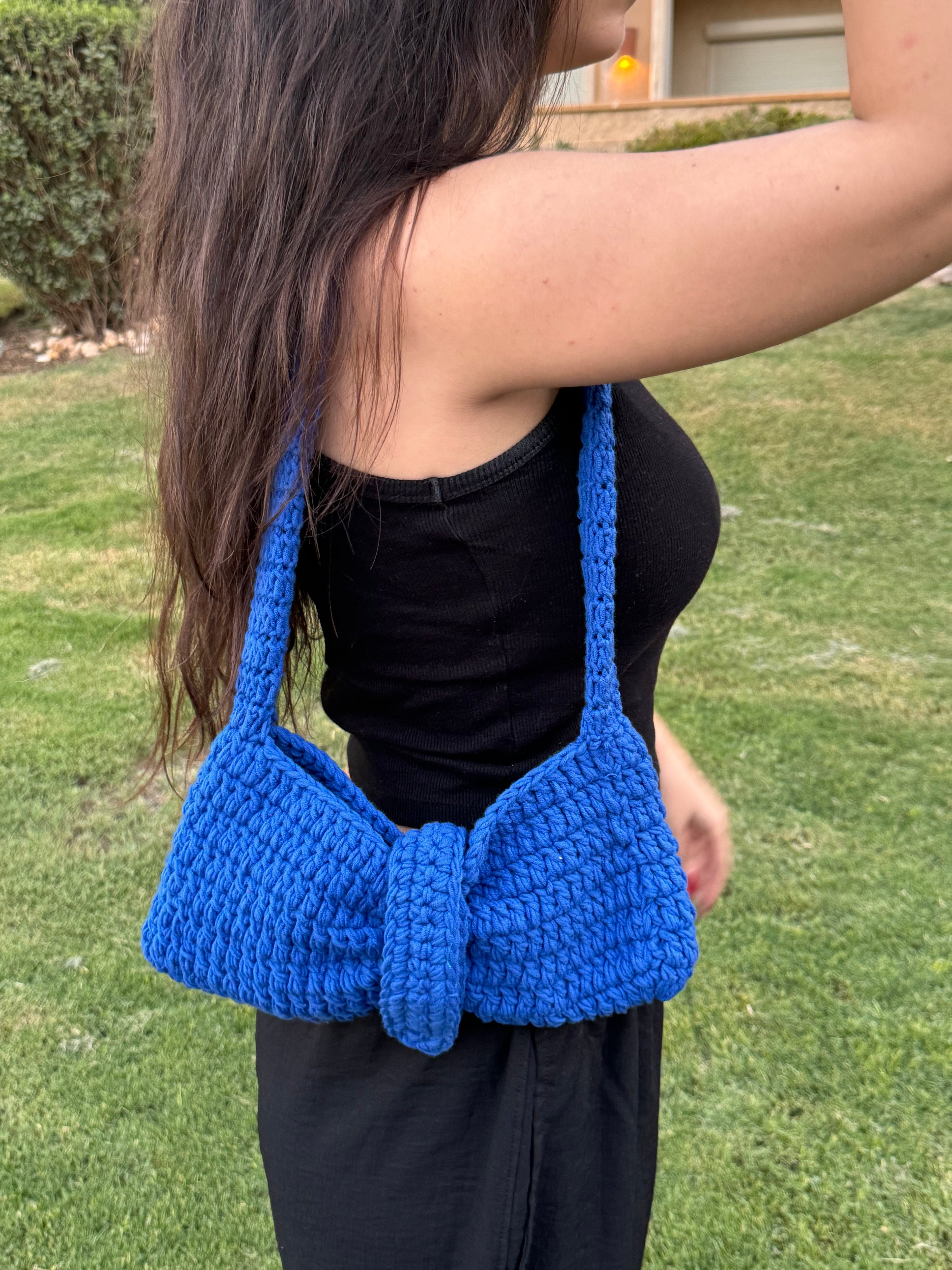 Royal blue bow crochet bag