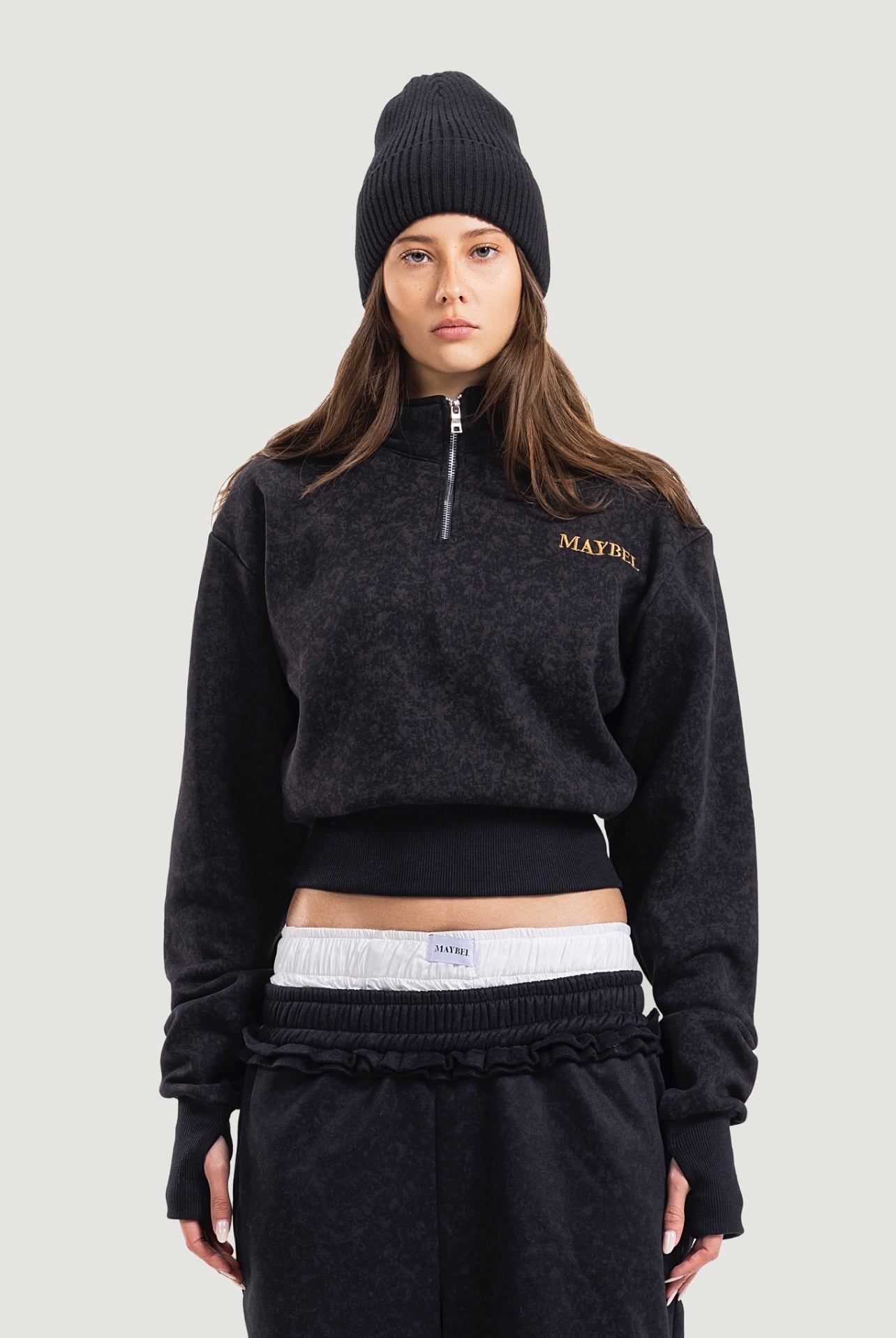 Black X nude quarter zipper